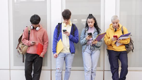 Teenager Students Using Smart Mobile Phones in College School Online Internet Social Media and