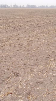 Vertical Video Empty Plowed Field in Autumn Aerial View