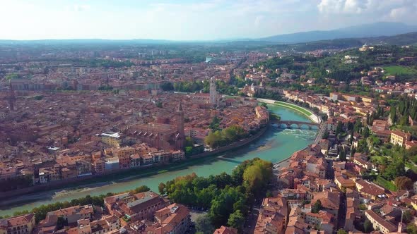 Panoramic Aerial Drone View of Medieval City of Love Verona, Pietra Bridge and Adige River