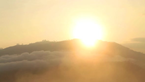 View of foggy sunrise on the Little Adam's Peak in Ella, Sri Lanka