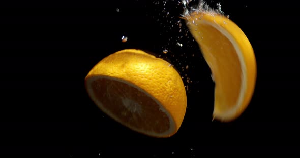 The Orange Slice Falls Into the Water. 