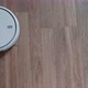 Robot vacuum cleaner performs automatic cleaning of the apartment. Smart Home. - VideoHive Item for Sale
