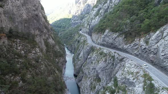 Aerial view of Tara river canyon, big mountains and road Montenegro, Europe