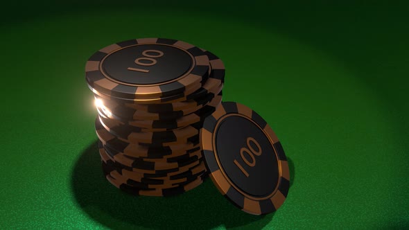 Poker chips with inscription 100 in golden black colors on gambling table.