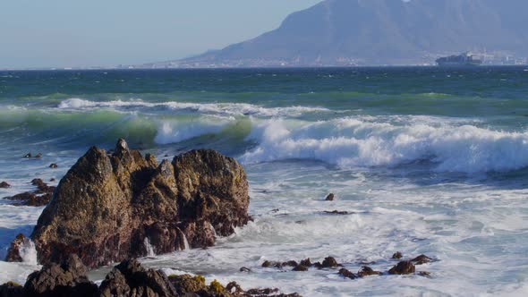 Scenic View of Waves at Atlantic Ocean Cape Town South AfricaTable Mountain in the Background with a