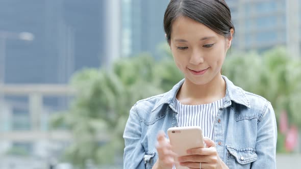 Woman using mobile phone