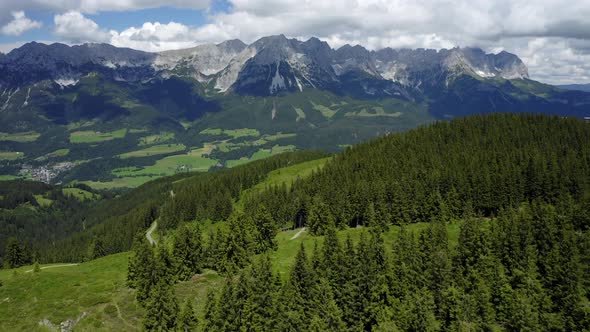 Aerial View of Pine Forest in Ellmau Wilderkaiser Mountains Peaks Austria