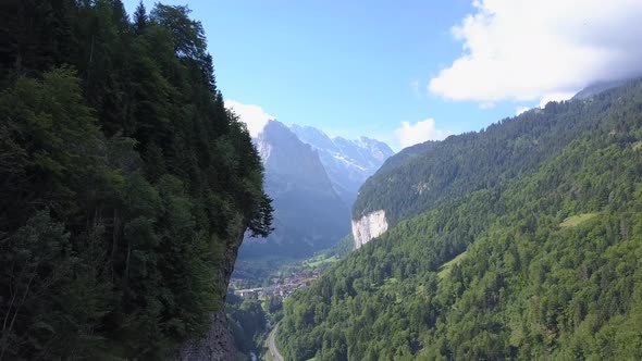 Aerial travel drone view of the Lauterbrunnen Valley, Switzerland.