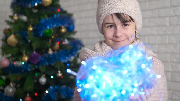 Teen with burning garland. 