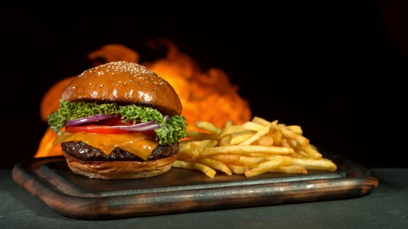Super Slow Motion Shot of Hamburger French Fries and Flames at 1000Fps
