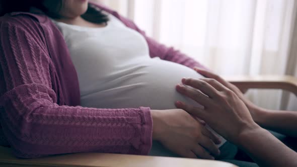 Pregnant Couple Feels Love and Relax at Home