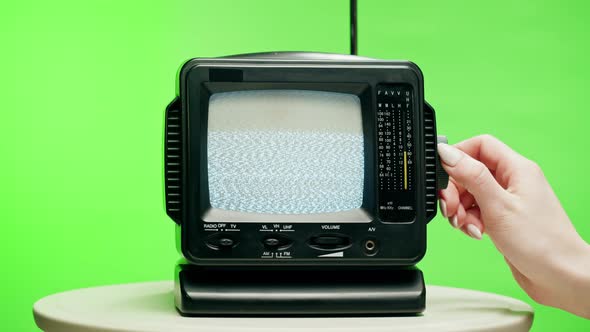 Small Old Television with Grey Interference Screen on Chroma Green Background