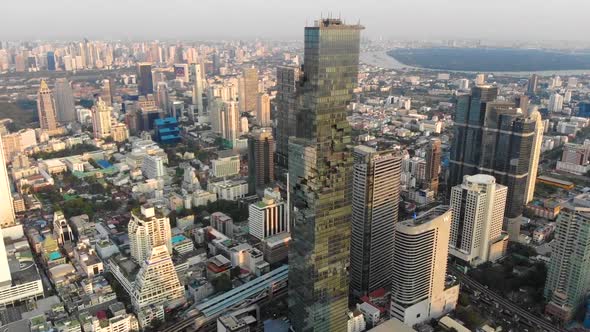 Drone flying towards King Power Mahanakhon building in Bangkok