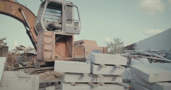 Save the planet. kids holding signs standing in a huge junkyard