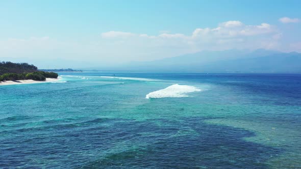 Aerial view travel of marine tourist beach break by blue green ocean and white sandy background of a