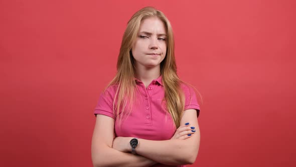 Young Woman Thinks Then Raising a Finger As a Sign of the Best Idea