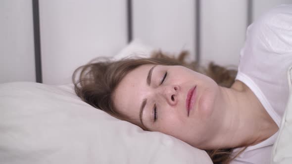 Insomnia, Irritated Female Trying to Sleep Annoyed by Bad Noisy Neighbors