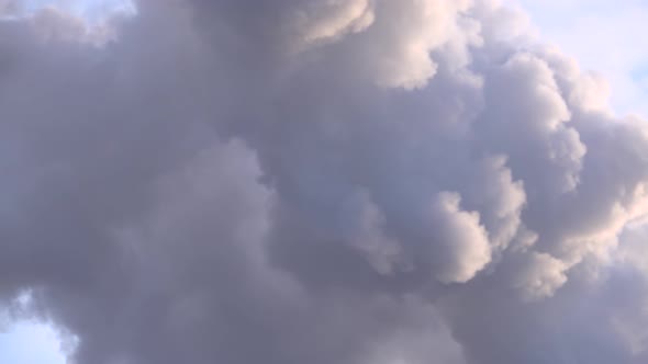 Factory Plant Smoke Stack Over Blue Sky Background