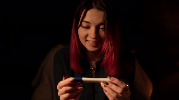 Woman Gets to Know a Positive Pregnancy Test Result and Share the News Using Her Phone