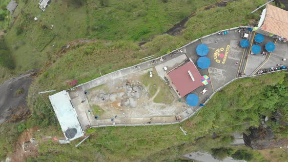 Top Down View On El Peñol Big Rock In Colombia - aerial drone shot