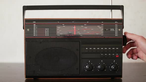 Radio Collector Tuning a Radio Wave in an Old Device