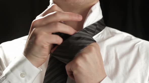 Tie dressing by anonymous businessman studio