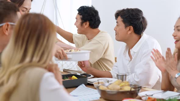 4K Group of Asian man and woman meeting celebration and having dinner together at home.