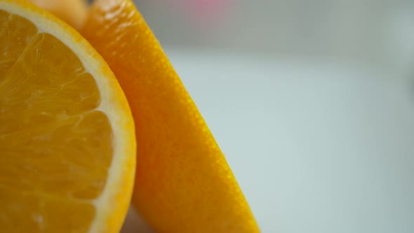 Orange fruit slice in slow motion