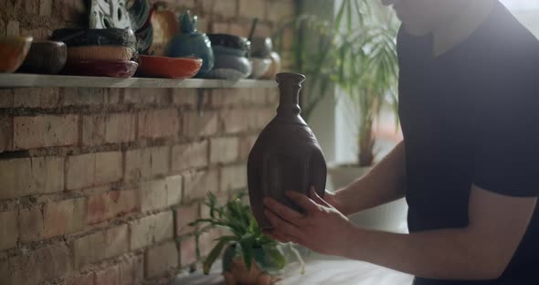 Potter Finalises a Clay Jug at His Workshop Video From Pottery Workshop Making the Ceramics in Slow