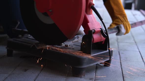 Professional Mechanic is Cutting Steel Metal