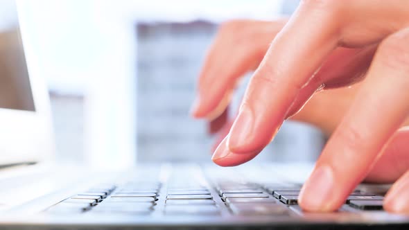 Typing on a Laptop Computer Keyboard. Blind Typing on Keyboard. Male Working at Computer. Hands