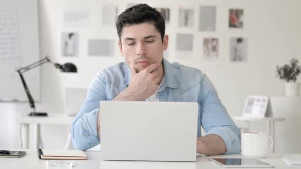 Casual Young Man with Headache