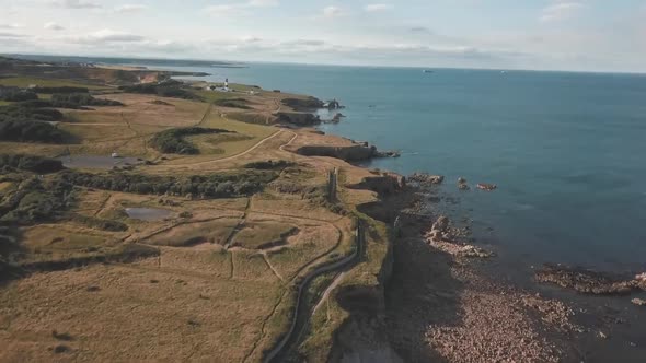 Aerial footage of Whitburn coastline in the North East of England on a summers day.