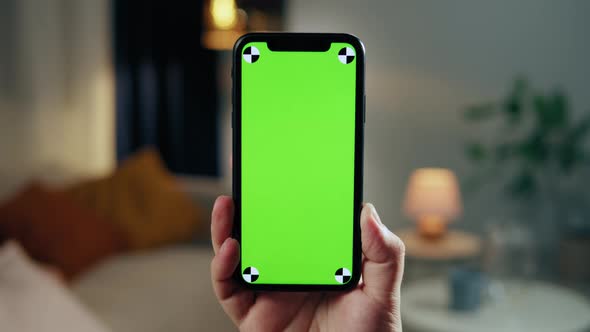 Man Using Smartphone with Chroma Key Closeup