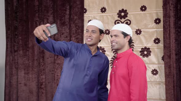 Muslim men clicking pictures