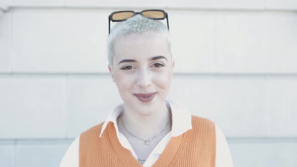 Young Hipster Woman Smiling at Camera  Portrait of 20s Trendy Girl Outdoors