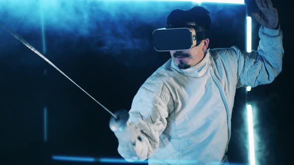 Male Fencer is Having a Virtual Training Session