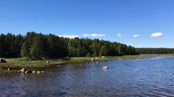 Spectacular view of lake and woods in Karelia. Camera motion from left to right