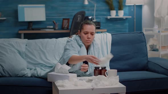 Sick Person Reading Medication Information Paper to Cure Disease