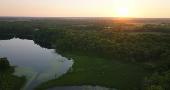 Sunset Over Lake And Fields View From Drone 1