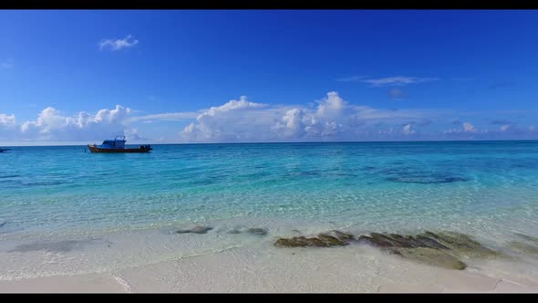 Aerial drone shot tourism of exotic sea view beach trip by blue sea and white sand background of a d