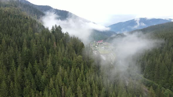 Mountains in Fog Slow Motion. Aerial View of the Carpathian Mountains in Autumn, Ukraine