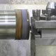 The Operation of Lathe Machine Cutting the Metal Shaft Parts - VideoHive Item for Sale