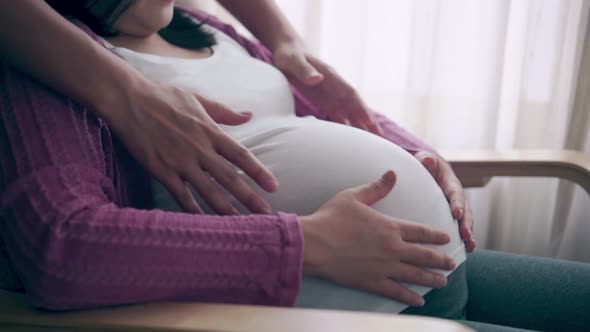 Pregnant Couple Feels Love and Relax at Home