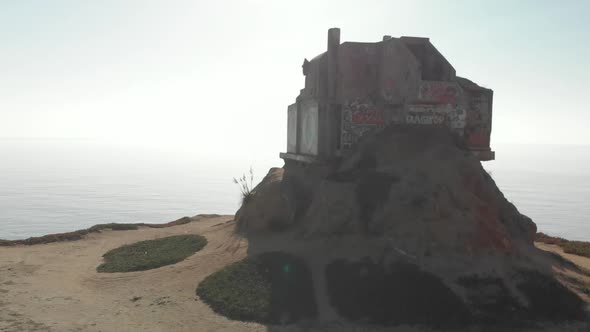 Rotating Aerial Pull Away From WWII Devil’s Slide Bunker on California Coast Highway One