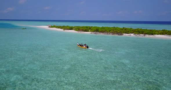 Beautiful above abstract shot of a summer white paradise sand beach and blue water background 