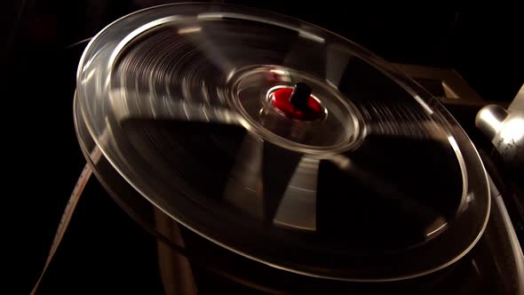 Film Reel Turning fast On Projector.