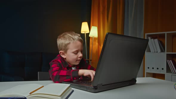 Portrait of Boy Learning Online at Home