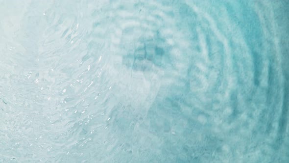 Super Slow Motion Shot of Clear Blue Sea Surface Waving Over White Sand Beach at 1000Fps alt