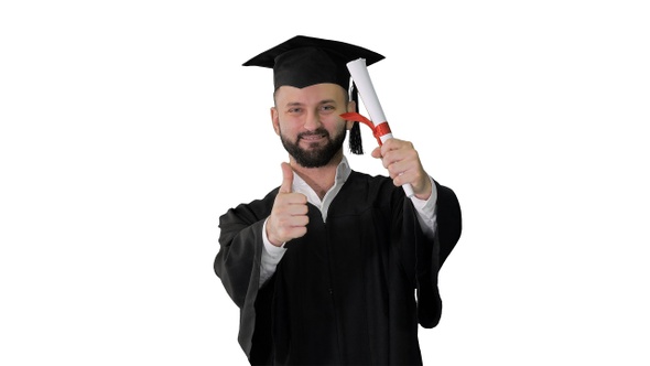 Young Male Smiling Graduate Showing Thumb up On White Background